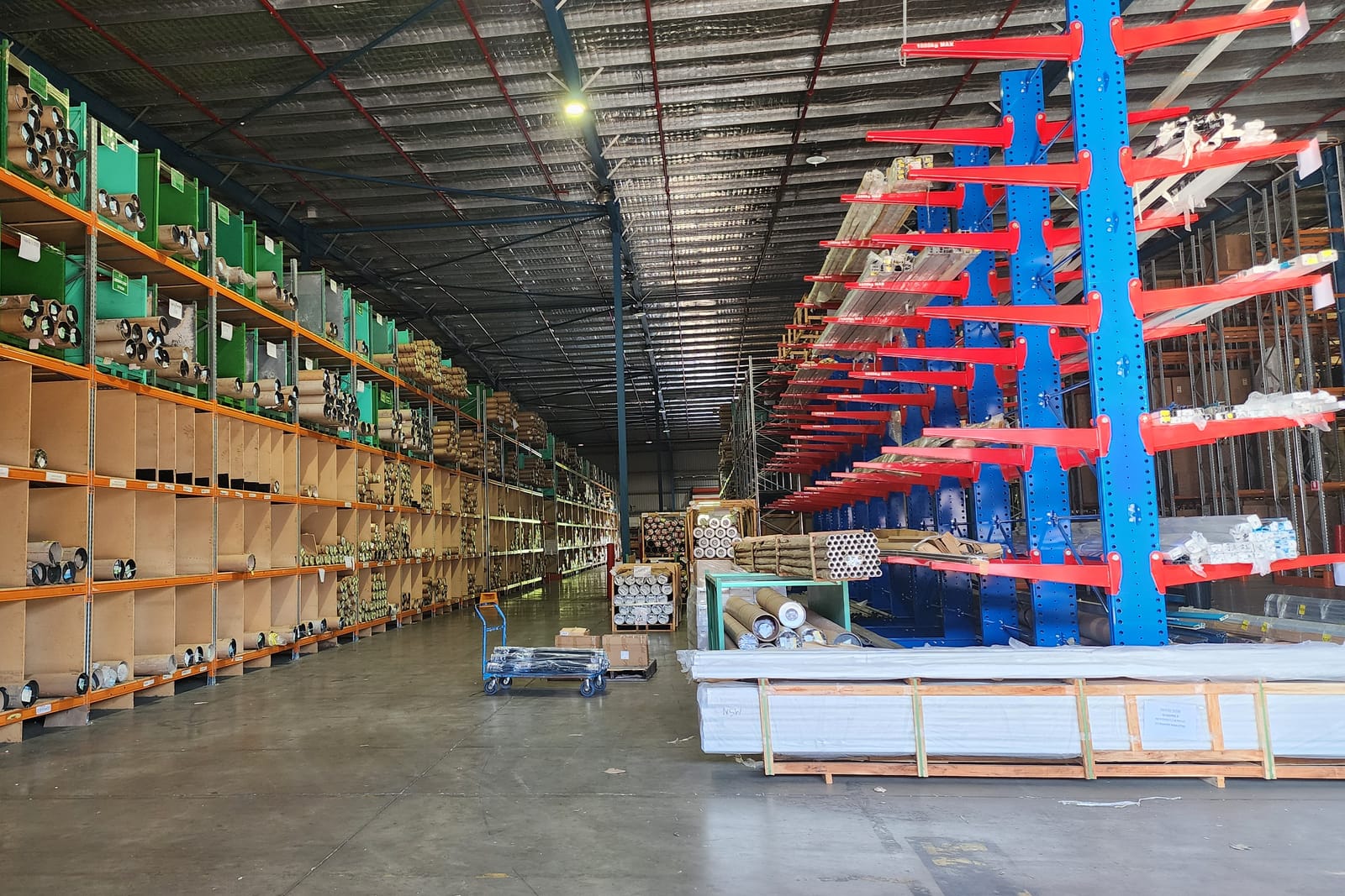Racked stock in a client distribution centre staffed by Calima